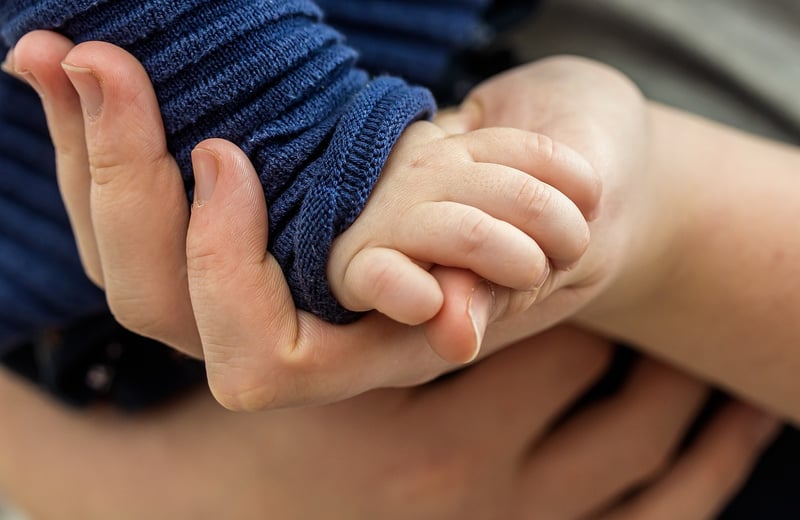 Diverse hands together
